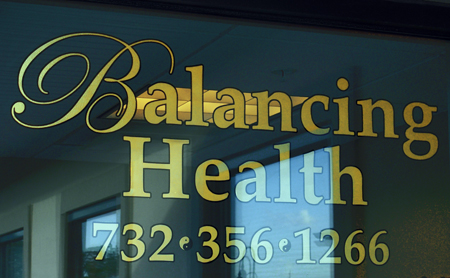 Glass Gilding gold leaf window lettering NYC Bob Gamache 23k gold leafing on glass New York City